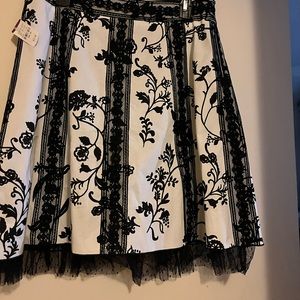 Brand new with tags lined skirt with ruffle bottom size 10